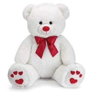 White teddy bear with red bow and hearts